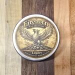 Before and after comparison of Legacy finish applied to a wood board showing the soft aged-silver pearl haze.