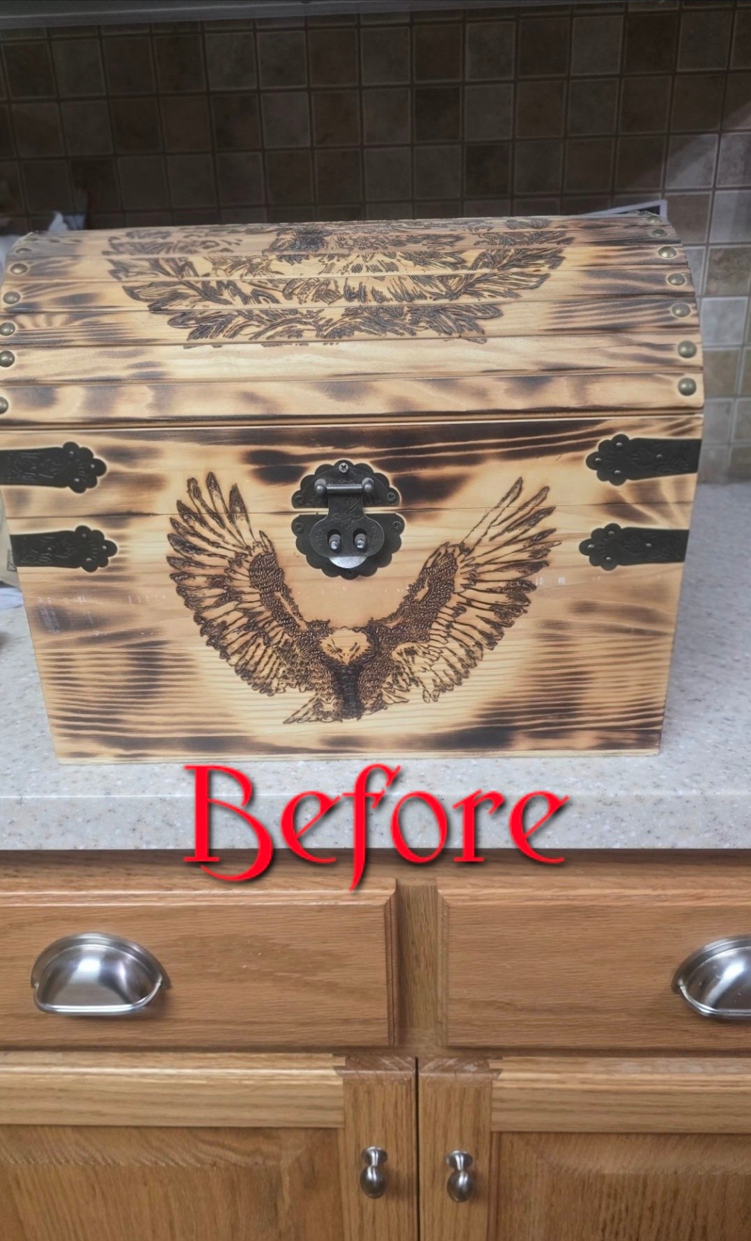 Raw wood treasure chest with pyrography art before applying Fireborn finish.